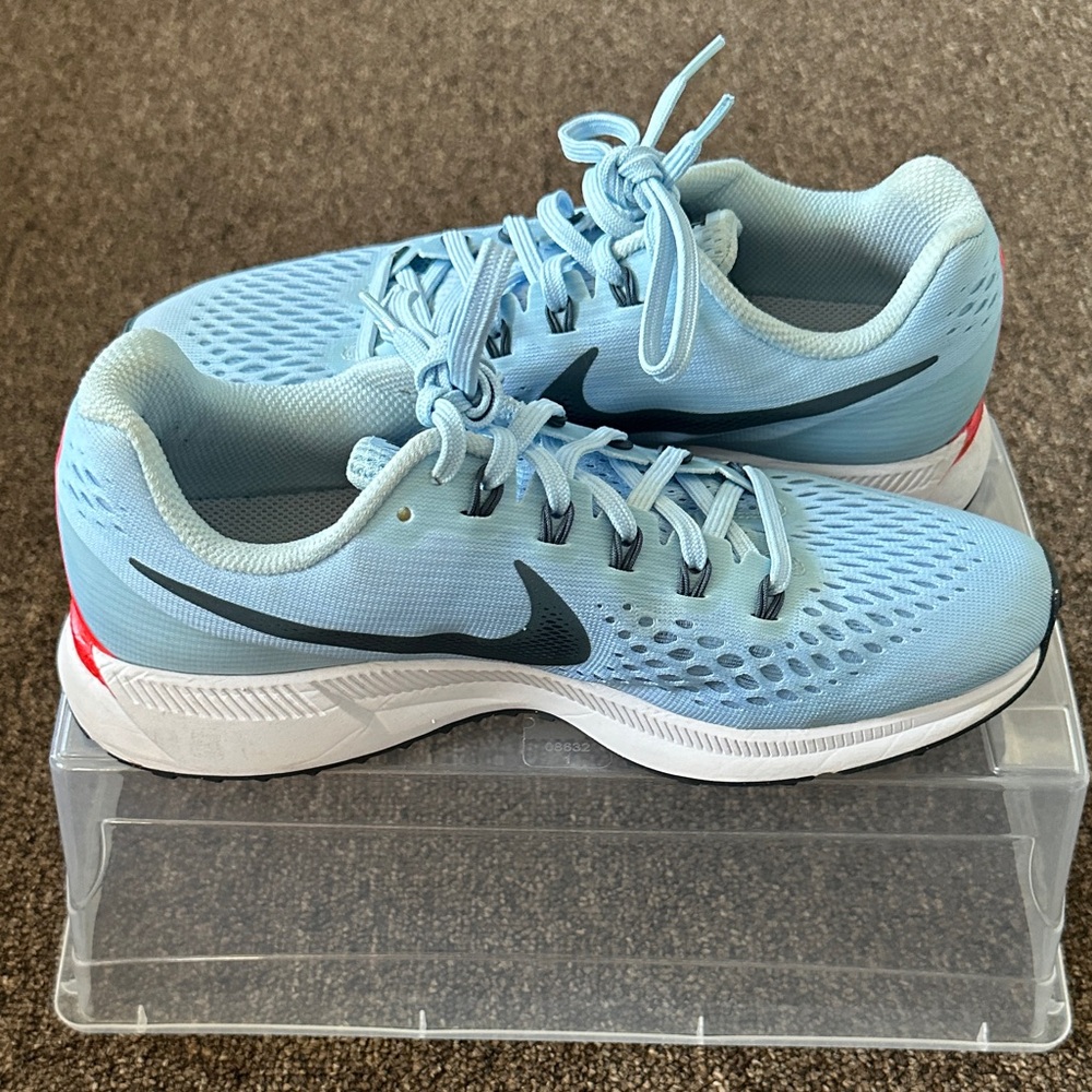 Nike Women's Light Blue Athletic Running Shoes with Black Swoosh